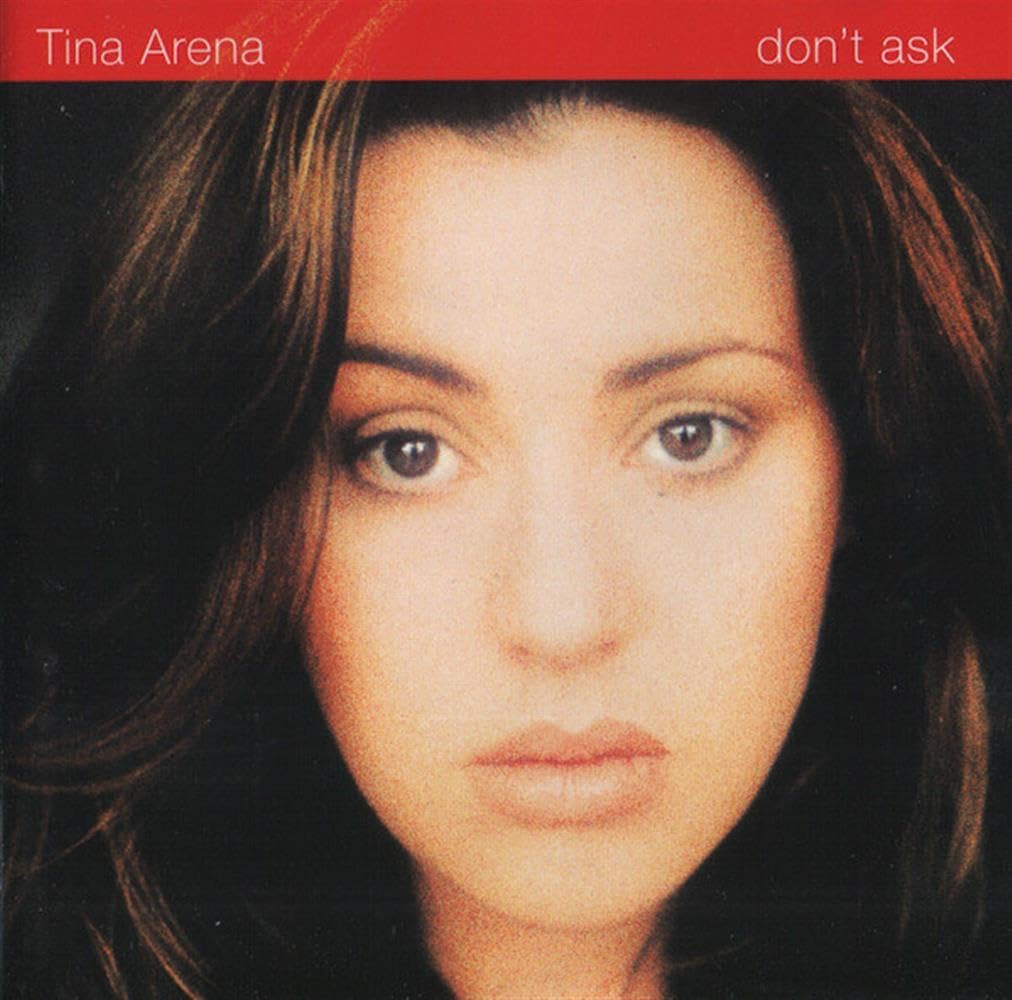 Album cover with a close-up of a person's face and text 'Tina Arena don't ask' at the top.