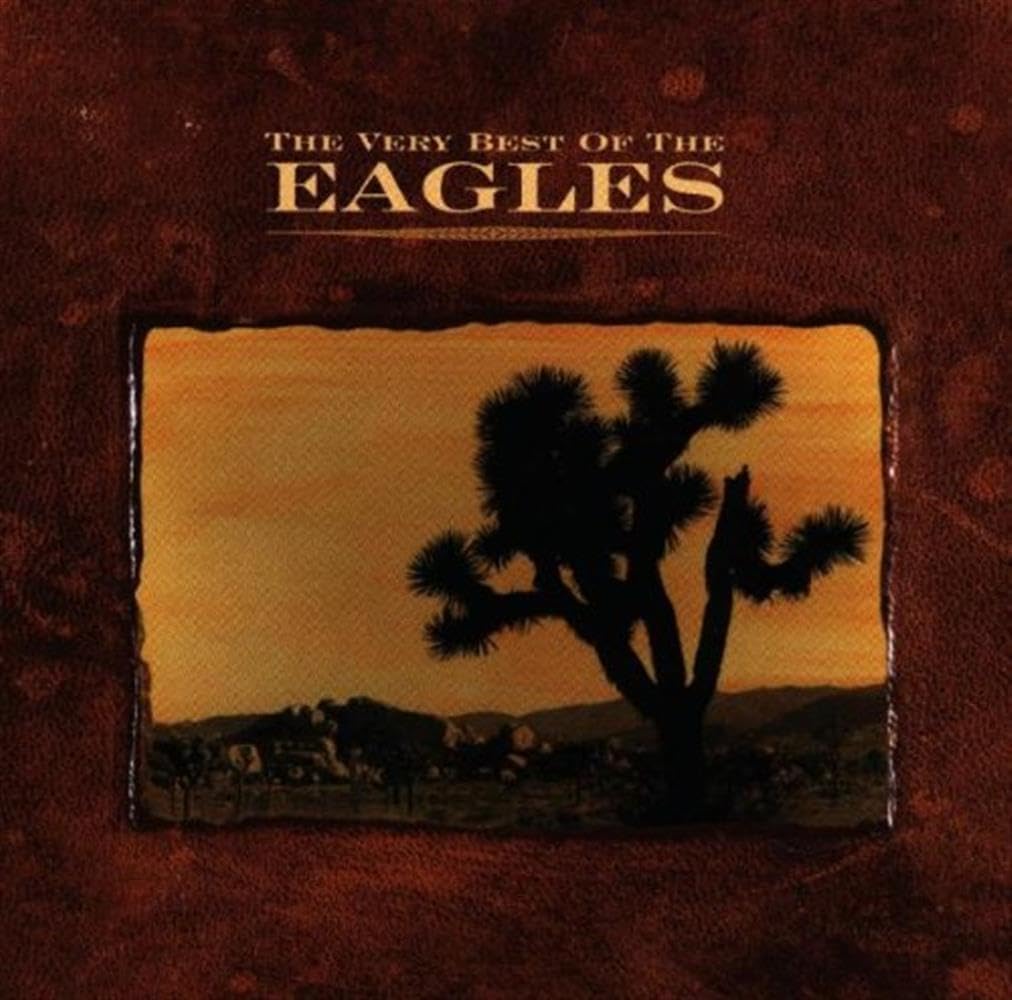 Album cover with silhouette of a Joshua tree against a sunset sky, featuring 'The Very Best Of The Eagles' text.