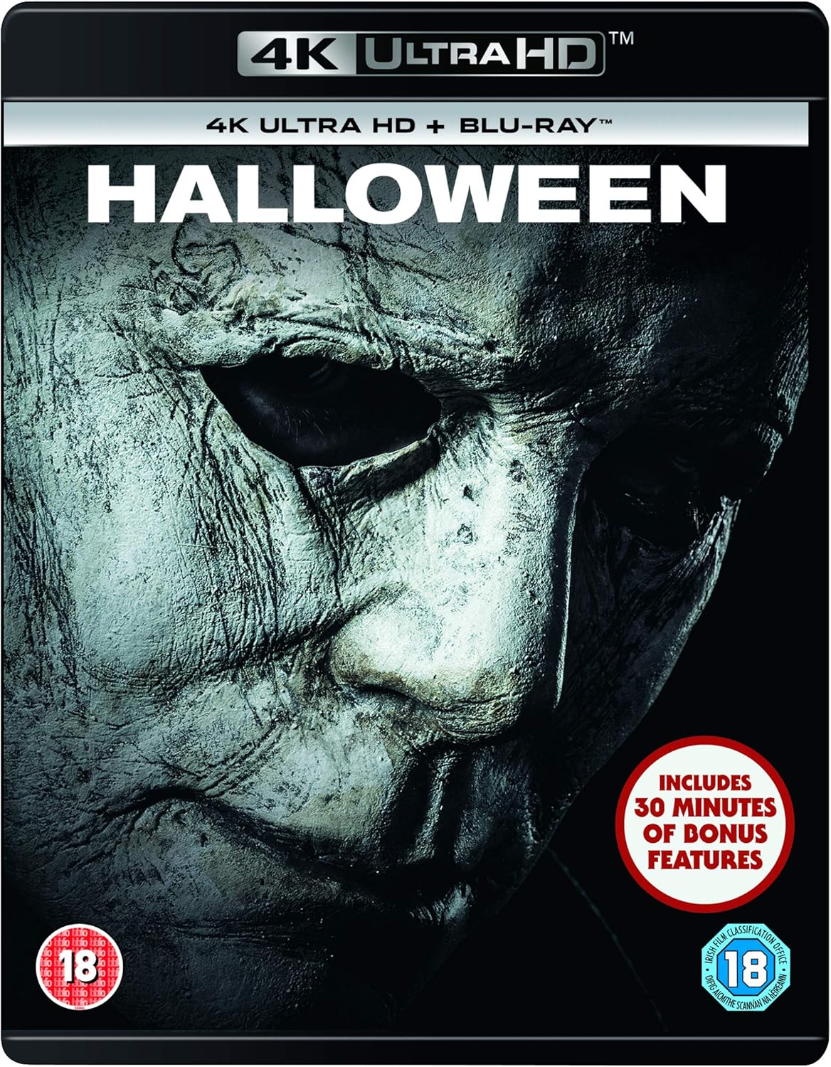 Blu-ray cover of 'Halloween' with a close-up of a mask, 4K Ultra HD branding, and additional text.
