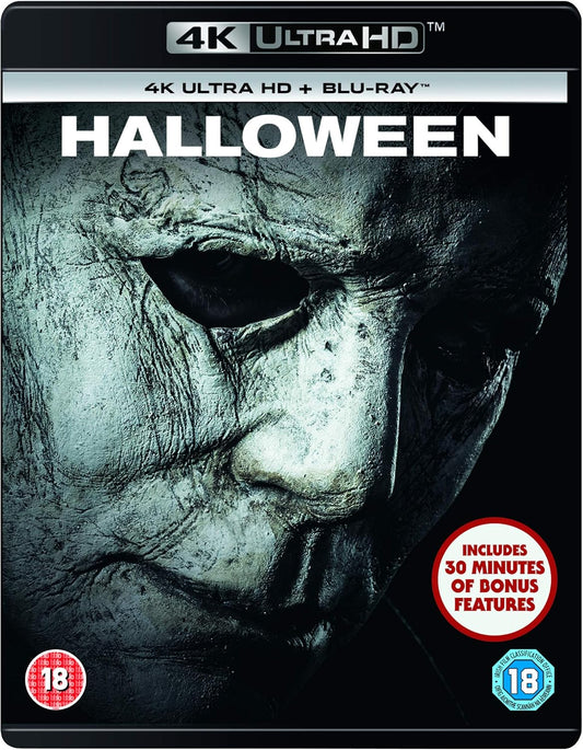 Blu-ray cover of 'Halloween' with a close-up of a mask, 4K Ultra HD branding, and additional text.