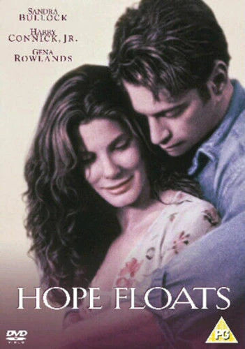 Movie poster for 'Hope Floats' featuring a couple embracing with text indicating actors and DVD information.