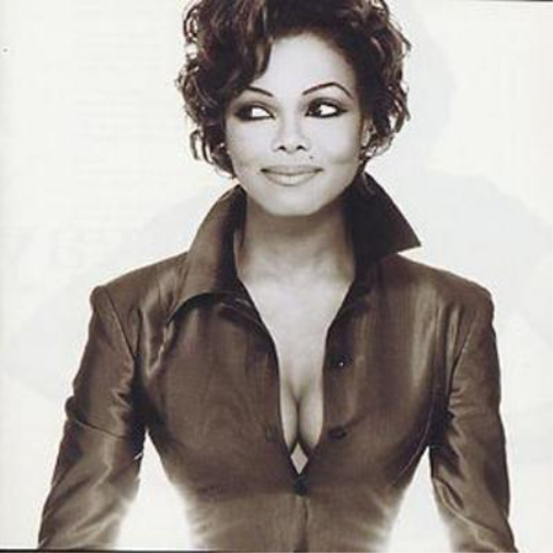 A black and white image of Janet Jackson on the cover of an audio CD titled 'Design Of A Decade 1986/1996'.