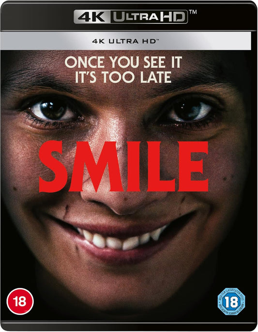 A DVD cover for the movie 'Smile' featuring a close-up image of an actress with a smile on her face, surrounded by a black background with the text '4K ULTRA HD' and a British film rating symbol.