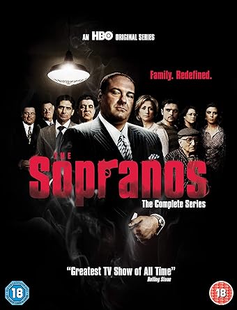 The cover of 'The Sopranos: The Complete Series' DVD box set features a black and white image of the main characters with subtle background details.