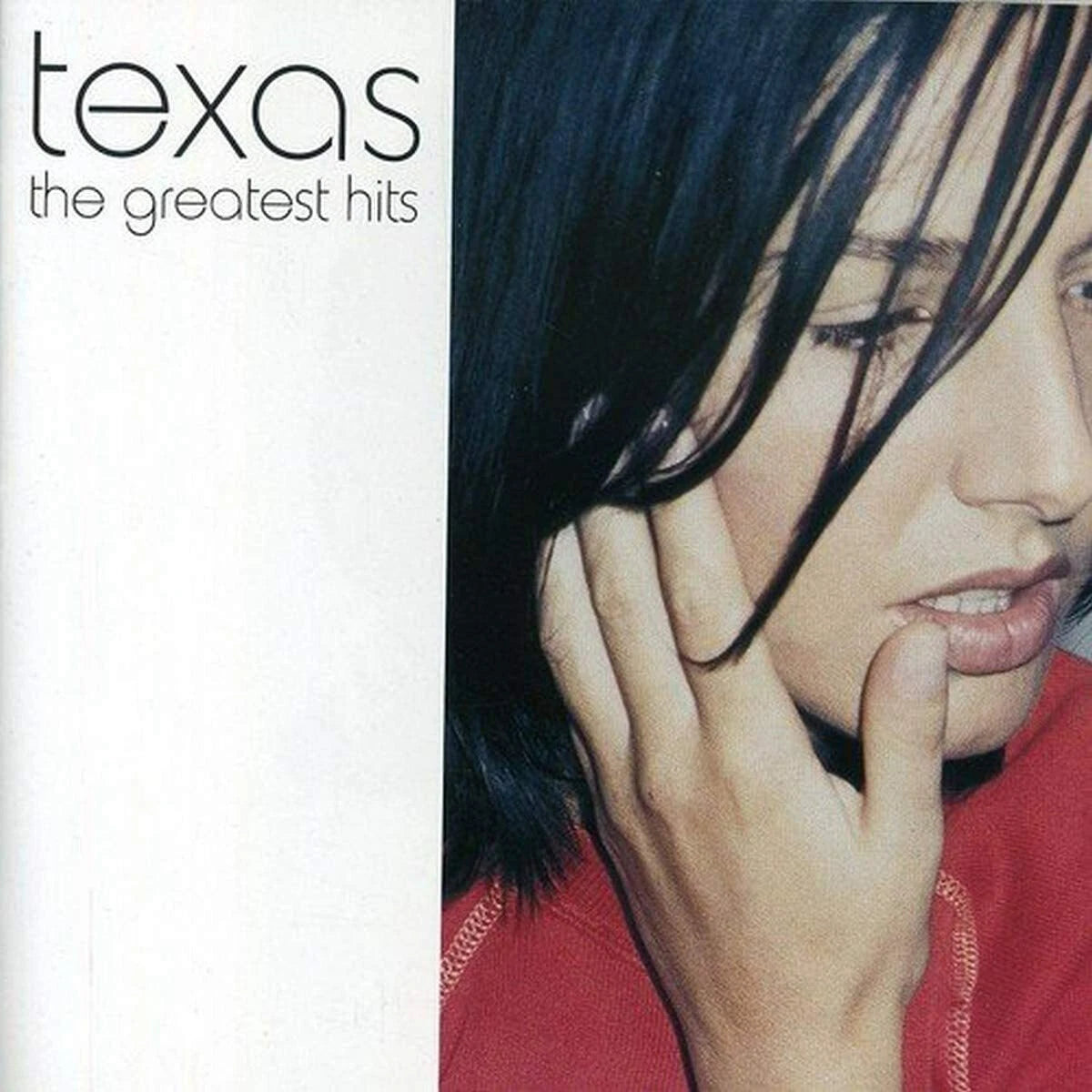 Album cover for 'The Greatest Hits' by Texas featuring a person with hair covering one eye.