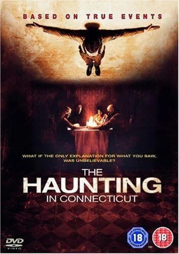 DVD cover of 'The Haunting in Connecticut' with a person falling and a candlelit scene.
