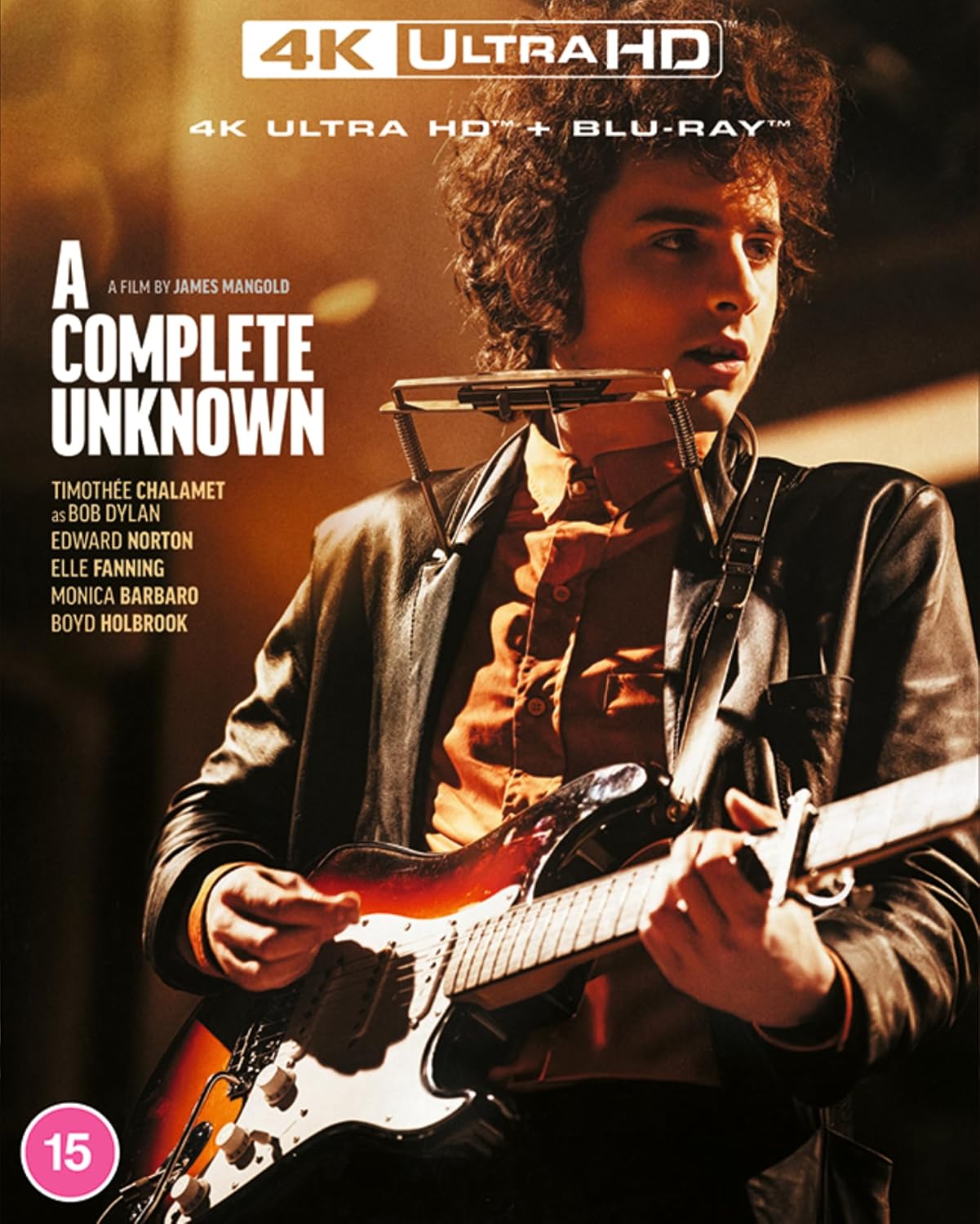 Blu-ray cover of 'A Complete Unknown' with a person playing guitar and holding a harmonica.
