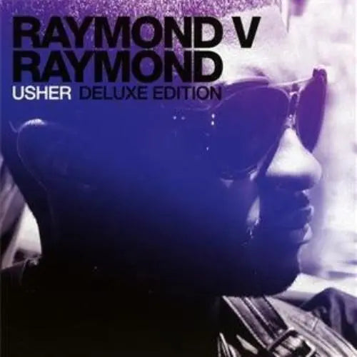 Audio CD cover featuring Usher Raymond with the title 'Raymond V Raymond [Deluxe Edition]' written in stylized text.