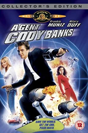 DVD cover for 'Agent Cody Banks' featuring a man on a rocket-like device with two women in the background, indicating an action-packed scene from the movie.