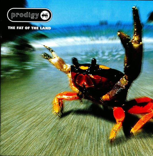The cover art features a close-up image of a red and yellow crab with a background of a stormy sea and foamy waves.