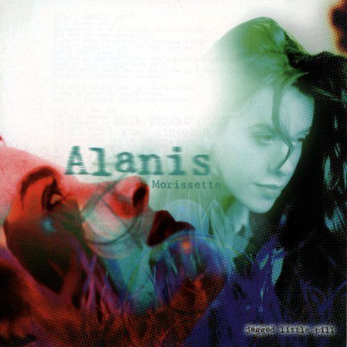 Album cover for 'Jagged Little Pill' by Alanis Morissette featuring a blurred image of the artist with her eyes closed, focused on the music.